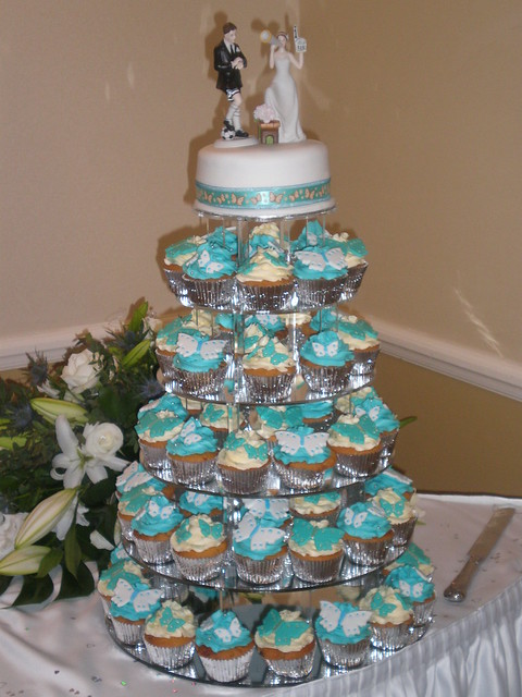The cupcakes are chocolate chip and fudge Wedding cake toppers were chosen