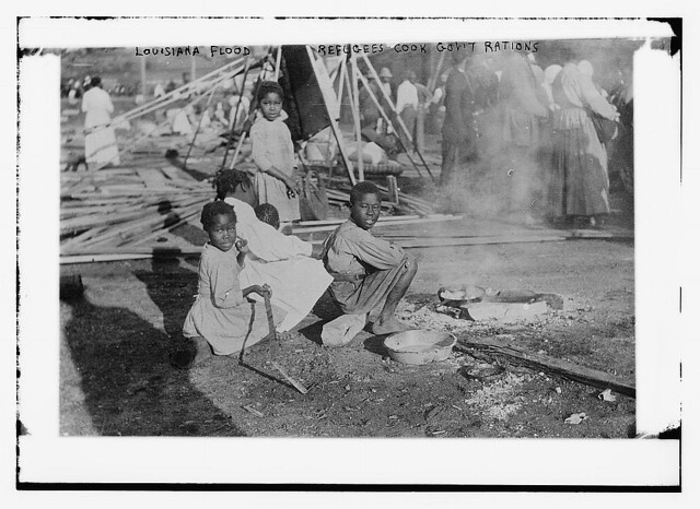 Louisiana Flood - refugees cook government rations (LOC)