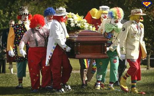 clowns carry coffin