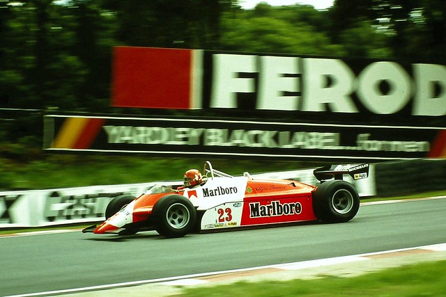 Bruno Giacomelli Alfa Romeo 182 heads out of Druids Bend during the 1982