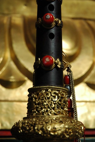Ornate Tibetan horn gold with coral in detail, Tharlam Monastery, Boudha, Kathmandu, Nepal by Wonderlane