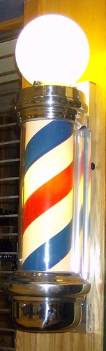 Photograph of lighted barber pole