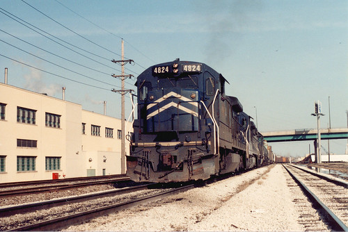 A westbound Union Pacific transfer train with former Missouri Pacific locomotives acquired through merger in 1982, heads toward Hayford Junction.  Chicago Illinois.  March 1985. by Eddie from Chicago