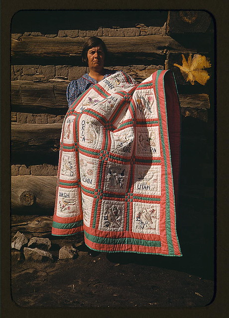 Mrs. Bill Stagg with state quilt which she made, Pie Town, New Mexico (LOC)