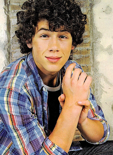 Nick Jonas He is so cute I love his eyes and his lips his hair his smile 