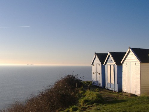 Cliff Top Beach Huts and Misty Contship by Lizziefrog