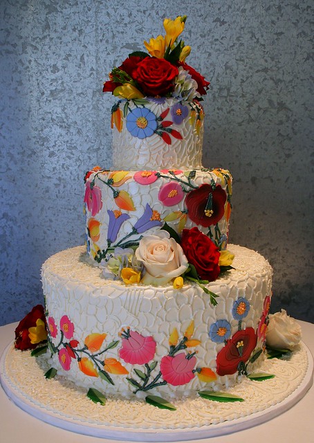 Floral And Lace Wedding cake with edible decoration depicting a lace 