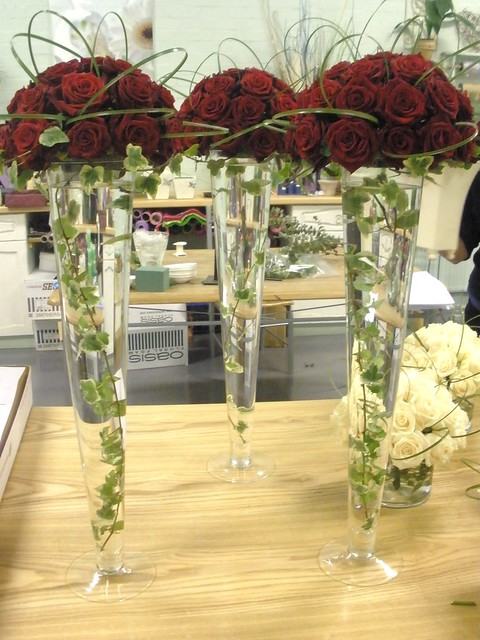 Wedding reception table arrangements To match the bridal flowers 