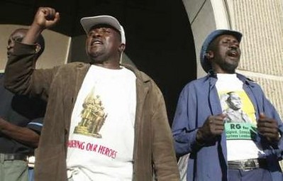 ZANU-PF supporters and revolutionary war veterans proclaiming their determination to defend the Zimbabwe government. by Pan-African News Wire File Photos