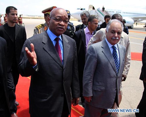 Republic of South Africa President Jacob Zuma with Libyan Prime Minister Baghdadi Mahmudi during his visit to Tripoli on May 30, 2011. The Libyan government accepted the African Union plan to resolve the conflict in this North African state. by Pan-African News Wire File Photos