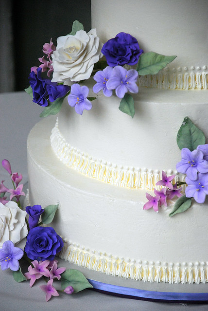 Purple 4 tier italian buttercream wedding Cake