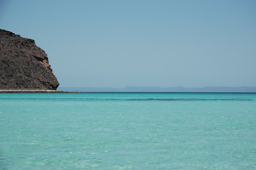 Turquoise waters near La Paz, coast, mountains in the distance, Baja California Sur, Mexico by Wonderlane