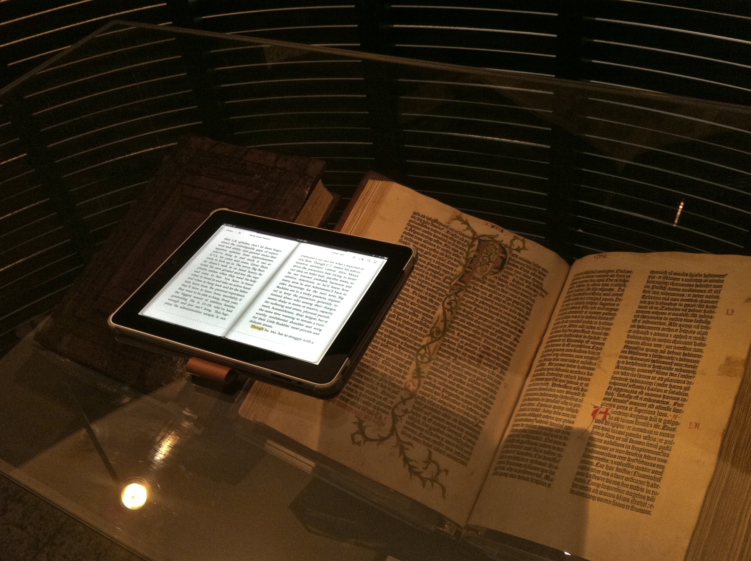 iPad book on top of a Guttenberg Bible