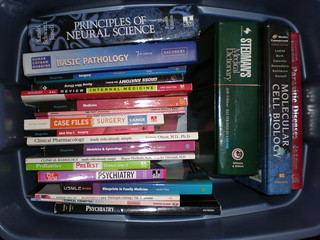 box of medical textbooks