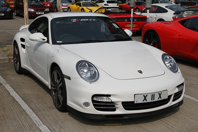 Not sure whats more interesting this cool white 911 Turbo or the 3 x 