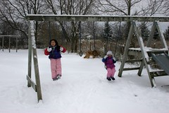 Girls on the Swingset in the Snow