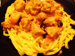 Rabbit-Stew in a mediterranian Tomato-sauce with Fettucini