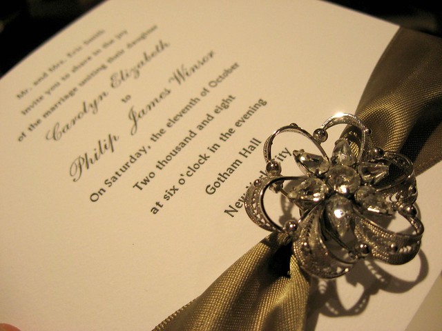 Custom made silk boxes with a letterpress wedding invitation and matching