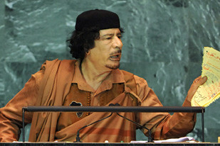 African Union chairman and Libyan leader, Muammar Gaddafi, spoke before the United Nations on its undemocratic character. by Pan-African News Wire File Photos