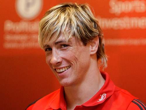Liverpool's Fernando Torres smiles during a news conference in Singapore