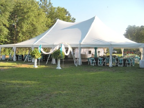  white wooden chairs and tiffany blue chair sashes just added so much to 