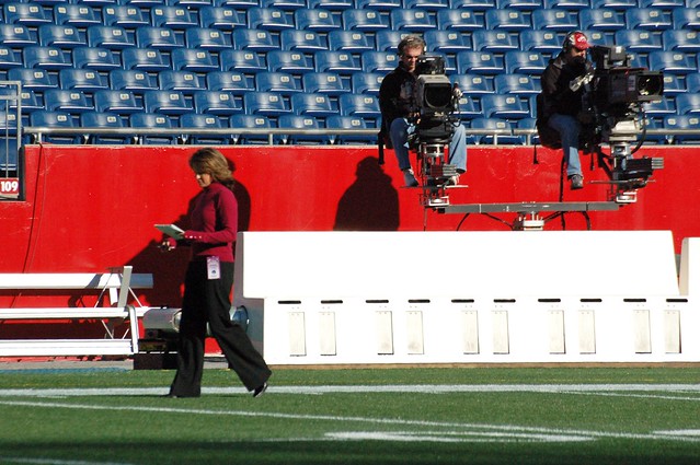 The cameras attempt to follow ESPN's Suzy Kolber as she walks the field 