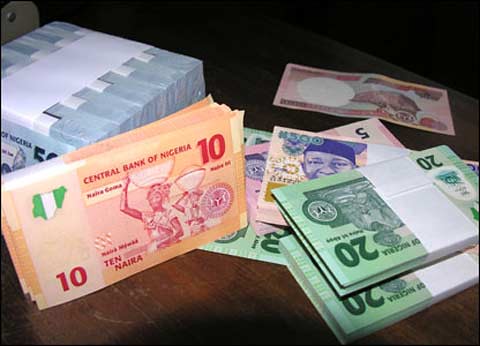 The national currency of Nigeria, the naira, is under tremendous pressure amid the crisis in the financial sector after the sacking of key bank executives and the suspension of trading in their shares. by Pan-African News Wire File Photos