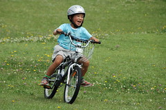 riding a bicycle without training wheels