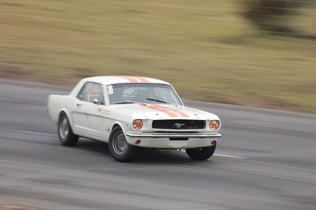 a drifting classic Ford Mustang on the niederrhein testtrack