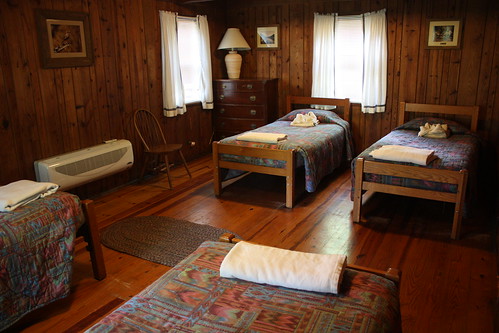 The four twin beds in Douthat Lodge make for a great kids room.