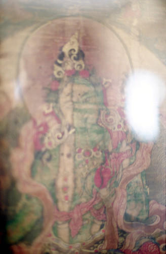 Detail of Lady Arya Green Tara from a Tibetan Thankga, collected at the Tibetan Works and Archives Library in Dharamsala, India, 1993 Pilgrimage by Wonderlane