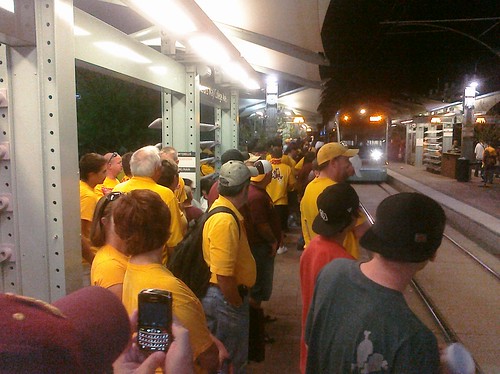 Sun Devil fans wait for light rail after a victory