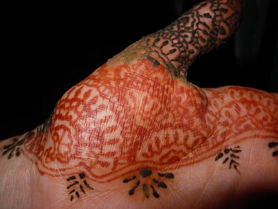 Henna tattoo hand design closeup