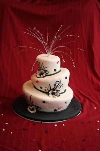 Black white red topsyturvy wedding cake Steph and Tony's wedding cake