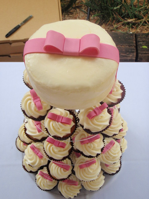 Pink bow wedding cupcakes Candy pink bows on choc mud and white choc mud 