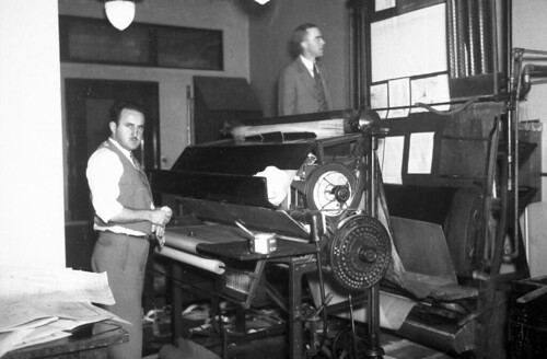 Men with printing press, circa 1930s