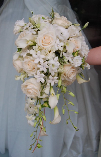 Cascade Bridal Bouquet White flowers such as roses mini callas 