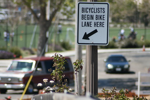 Bicyclists begin bike lane here