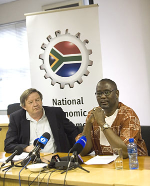 Co-chairs of the Millennium Labour Council Bobby Godsell (left) and Zwelinzima Vavi are pictured in Johannesburg on December 8, 2009 where they presented a proposal for preserving jobs and avoiding retrenchments. by Pan-African News Wire File Photos