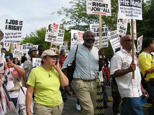 Abayomi Azikiwe, editor of the Pan-African News Wire, with IAC co-director Sara Flounders, covering the National March for Jobs in Pittsburgh on September 20, 2009. The event kicked off a week of protests surrounding the G20 summit. (Photo: Alan Pollock) by Pan-African News Wire File Photos