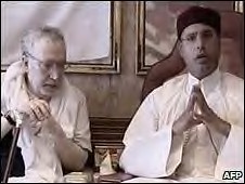Former Libyan political prisoner Abdel Basset al-Megrahi and Seif al-Islam speaking on national television after Abdel's release from a Scottish prison. The US administration has made political attacks on Libya in the aftermath of his return. by Pan-African News Wire File Photos