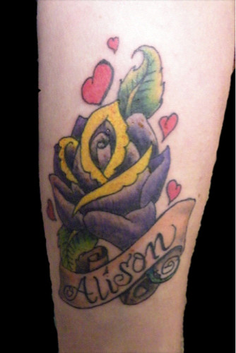 Rose with banner tattoo