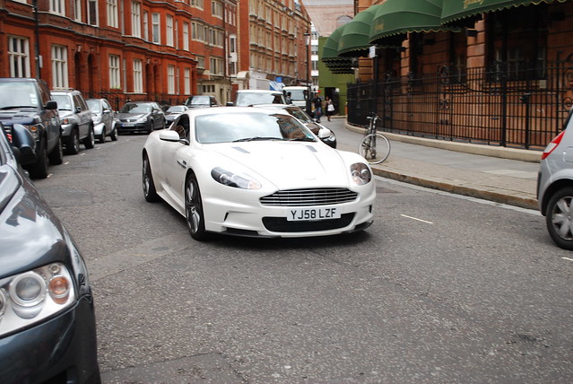  Richard T Smith Aston Martin DBS V12 Coupe Driving past Harrods 