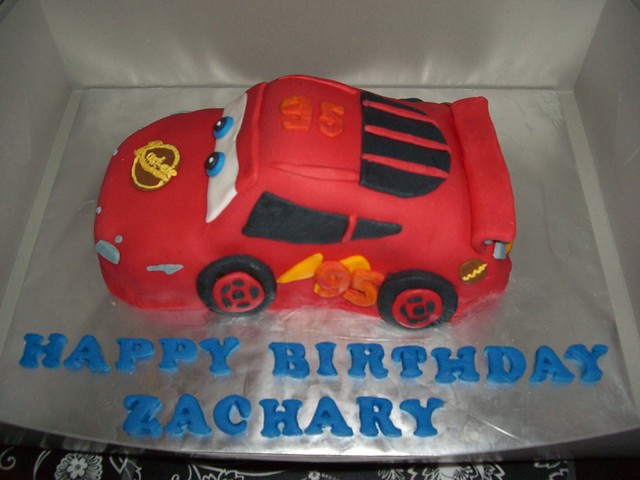 Lightning McQueen side view Chocolate fudge cake covered in sugarpaste