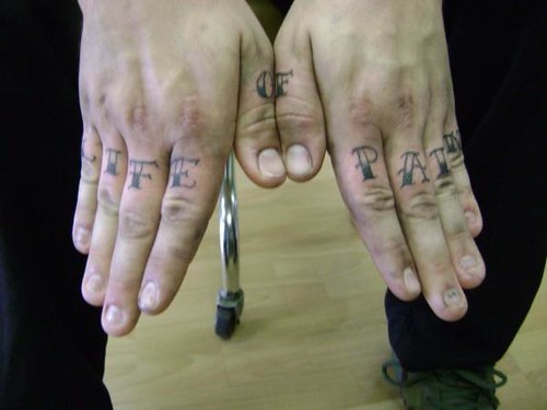 lettering tattoo on hands Justin at Kats Like Us Tattoos