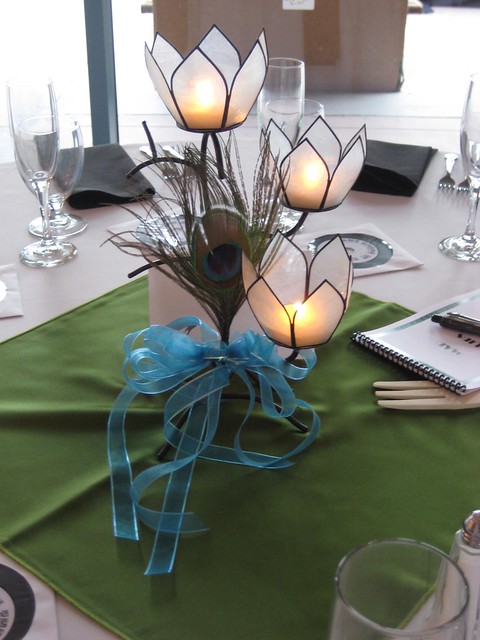 Wedding centerpieces with peacock feathers