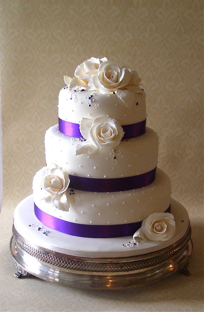 Ivory purple rose wedding cake