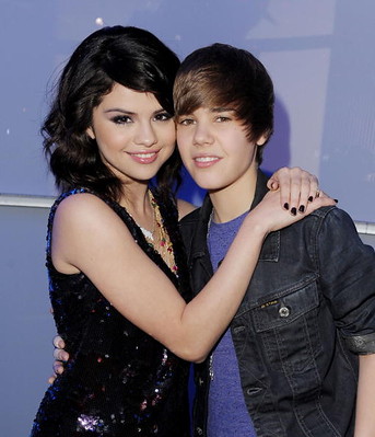 LAS VEGAS DECEMBER 31 Singers Selena Gomez L and Justin Bieber attend 