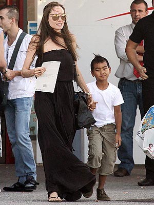 Angelina Jolie in a Casual Black Strapless Maxi Dress with 8YearOld Maddox 