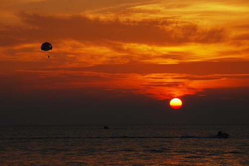 Parachute over sunset